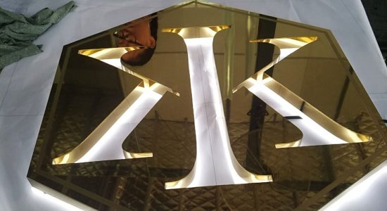 Gold Logo AVS Group Global Backlit Lettering