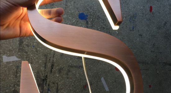 Rose Gold S AVS Group Global Backlit Lettering