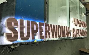 Superwoman AVS Group Global Backlit Lettering