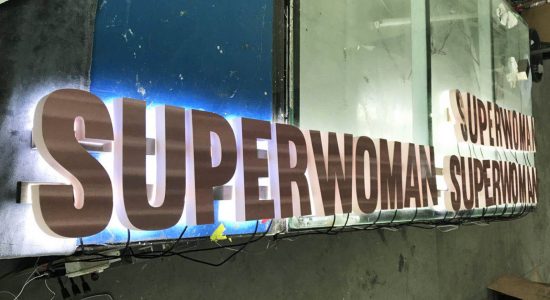 Superwoman AVS Group Global Backlit Lettering