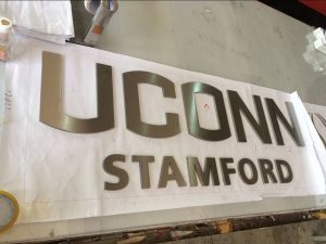 UCONN Stamford AVS Group Global Brass & Stainless Steel Lettering